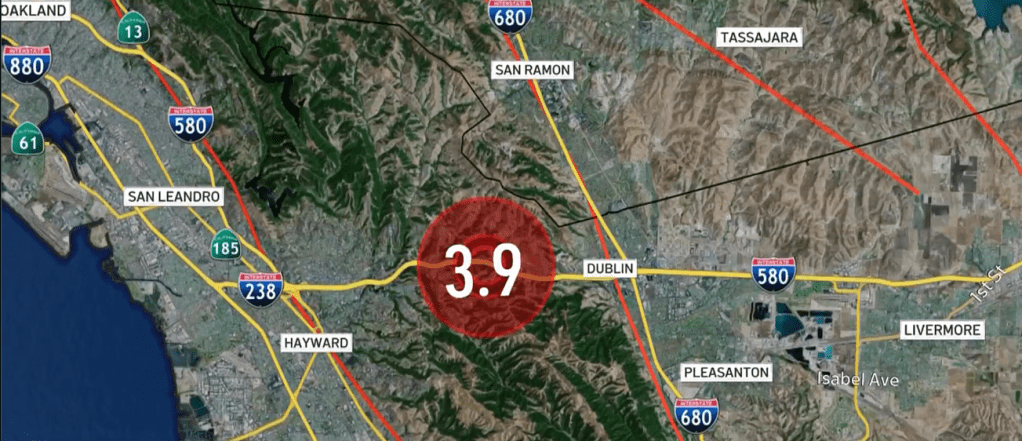 Map highlighting Dublin, California, with a red circle indicating a 3.9 magnitude earthquake near the area, showcasing nearby highways and geographical features.
